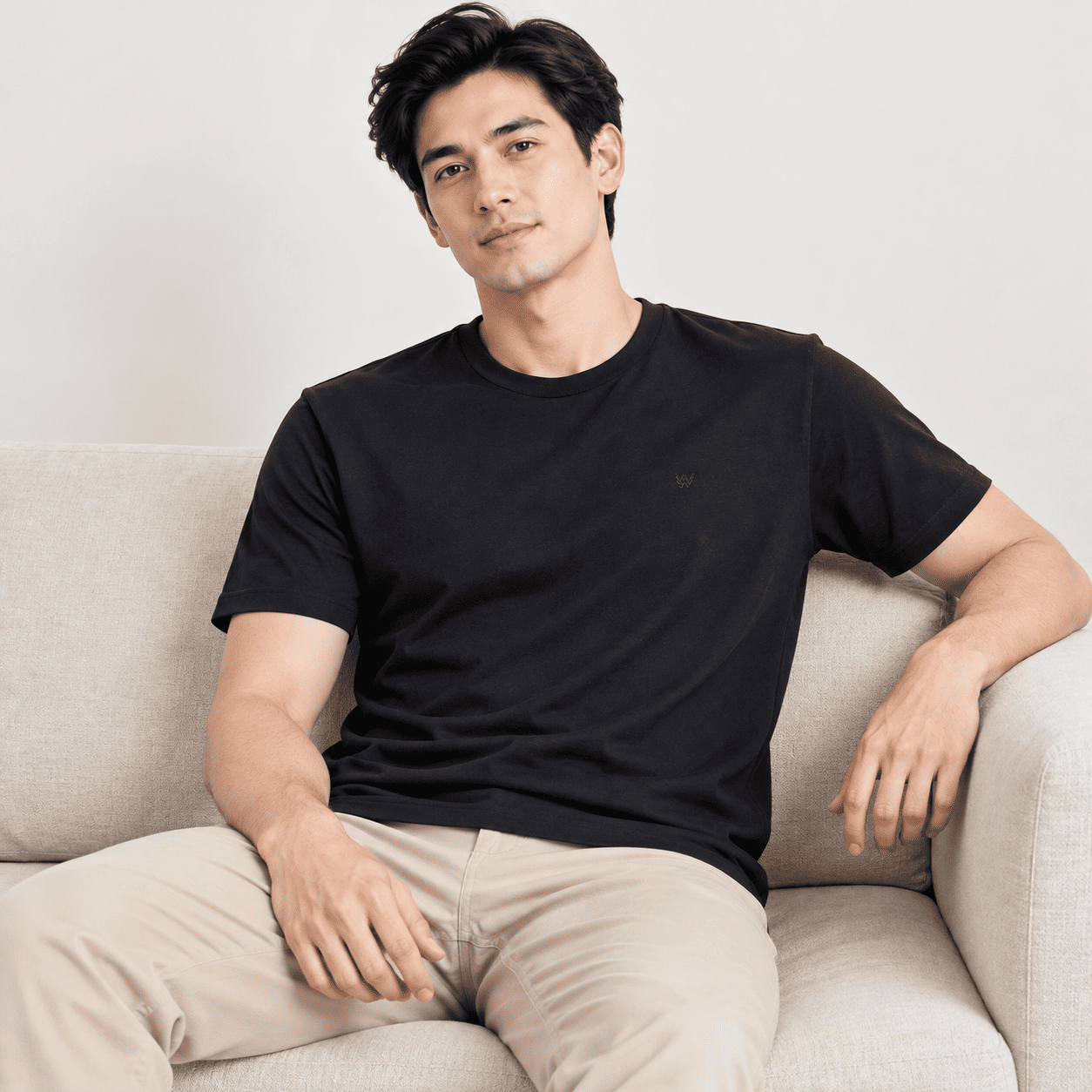 relaxed_portrait_on_a_cream_sofa.png
